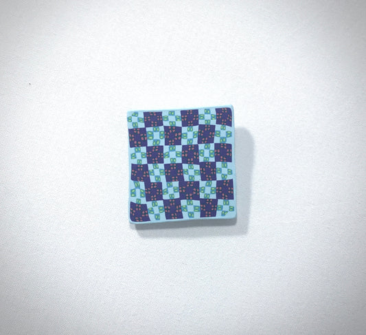 Checker board pin